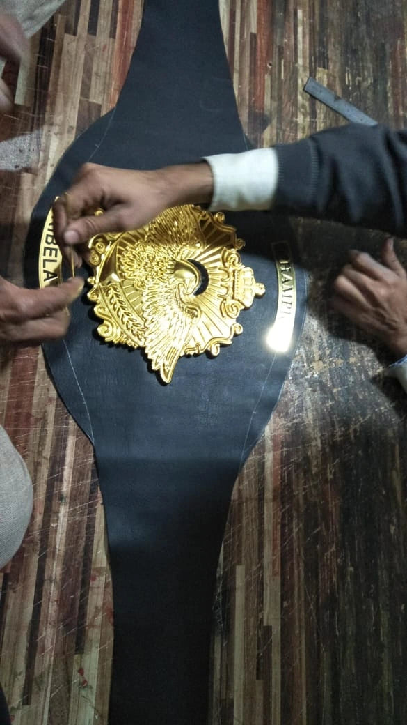 Leather strap shaped and prepared before assembling custom title belt.