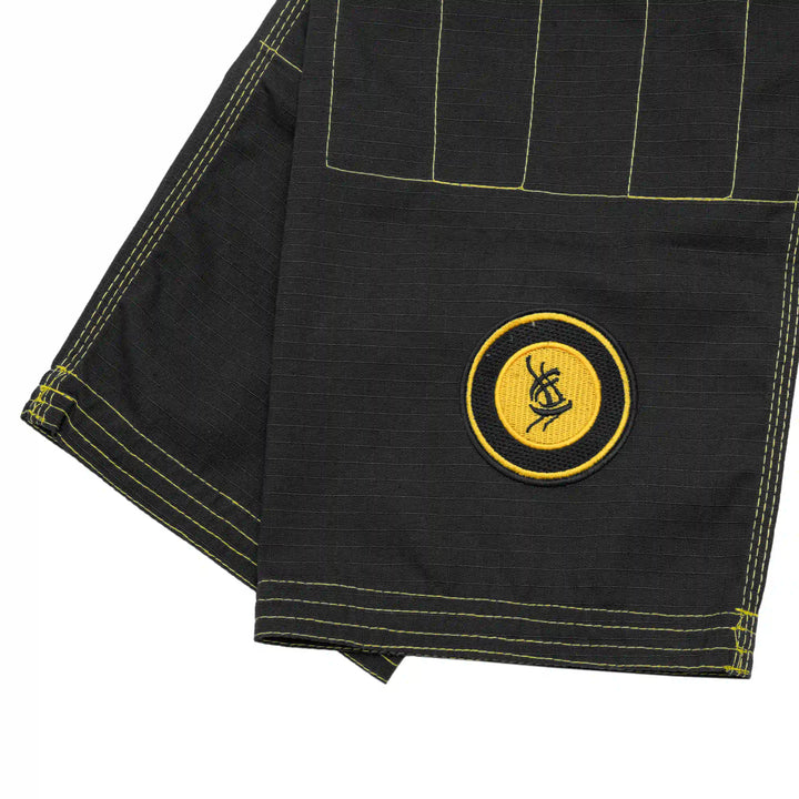 Front closeup of black 10 oz ripstop BJJ pants – UAEJJF legal for kids