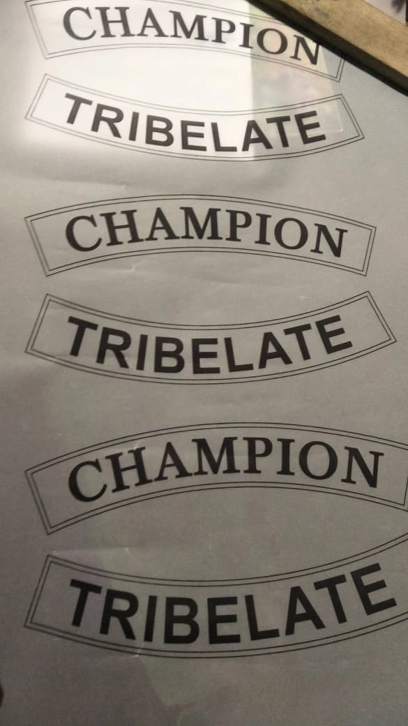 Positive print of champion plate design used as a guide for engraving process.