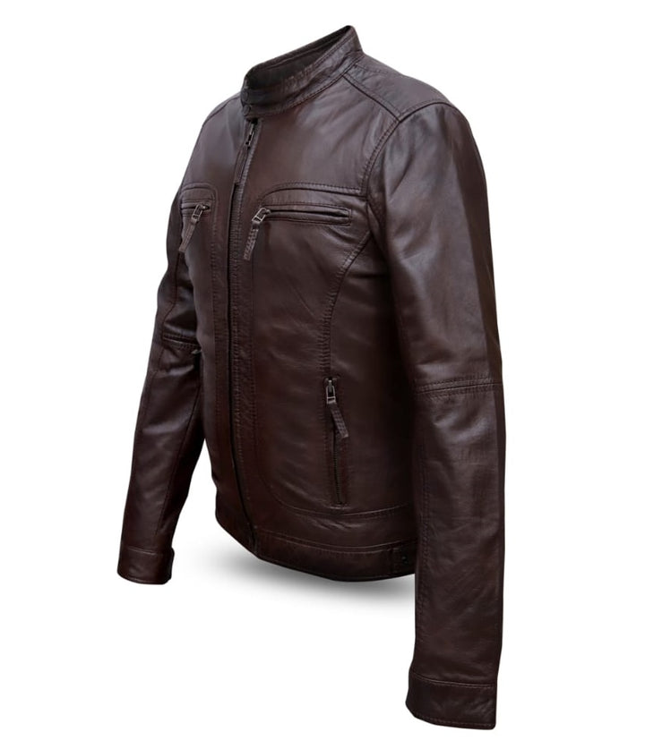 “Close-up of snap-tab collar and chest zippers on biker jacket”