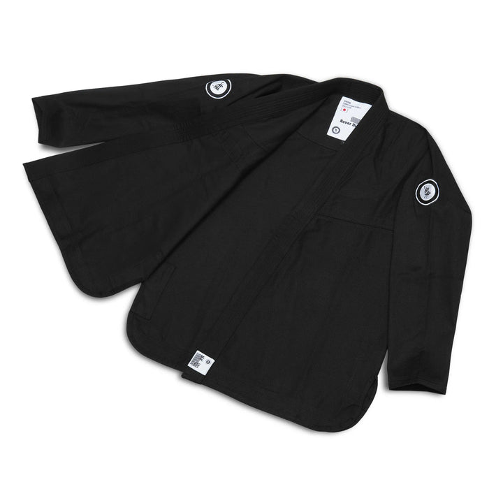 Close-up of black pearl weave fabric detail on Sahib Competition Series Kyushu 1877 BJJ gi