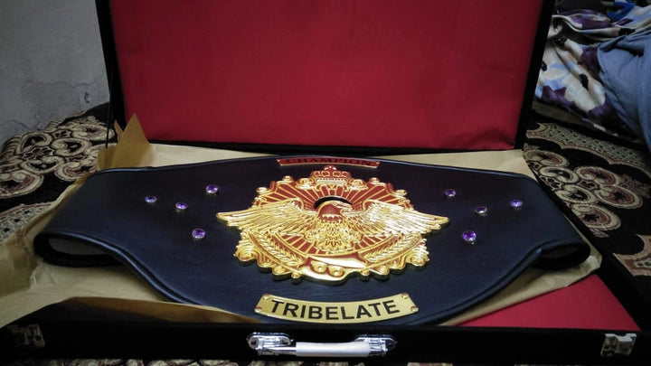 Close-up of personalized championship belt presented in a premium display box.