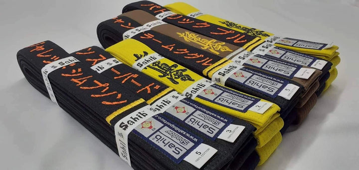 "Custom kyokushin belt set with name, and logo"