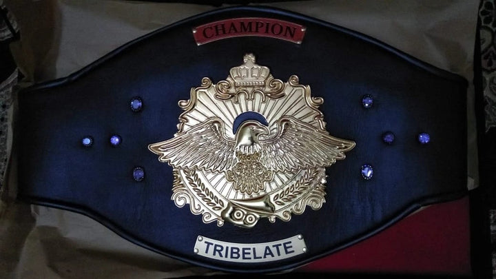 Zoomed-in detail of engraved name section on custom-made title belt.