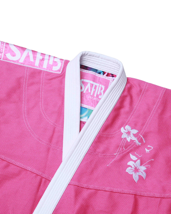 Close-up embroidery and texture on Sahib Girl Power pink women’s Jiu Jitsu kimono jacket