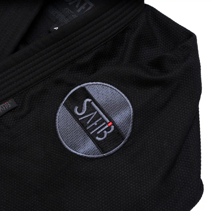 Right side embroidery detail of Sahib® Artificial Series BJJ Gi – durable stitching and AI design on black gi