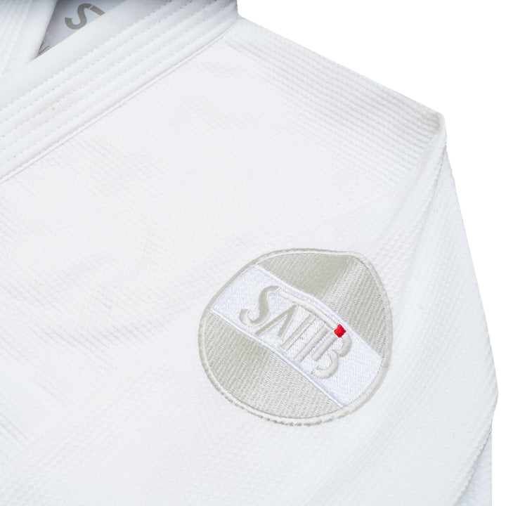Close-up of right sleeve embroidery – Sahib® Artificial Series white BJJ Gi with tech-inspired design