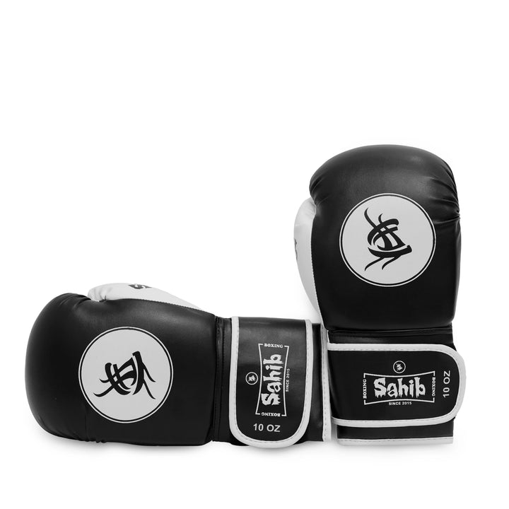 Front view of black Sahib® boxing gloves – sleek style with protective padding