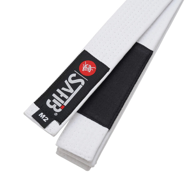 Close-up of white junior BJJ belt – 9‑row stitching for kids' training durability