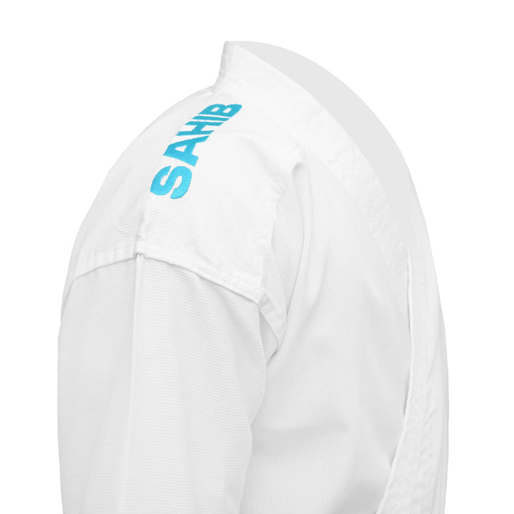 Sahib® Sakura Blue Label Karate Gi – embroidered shoulder detail for tournament-ready martial arts gear