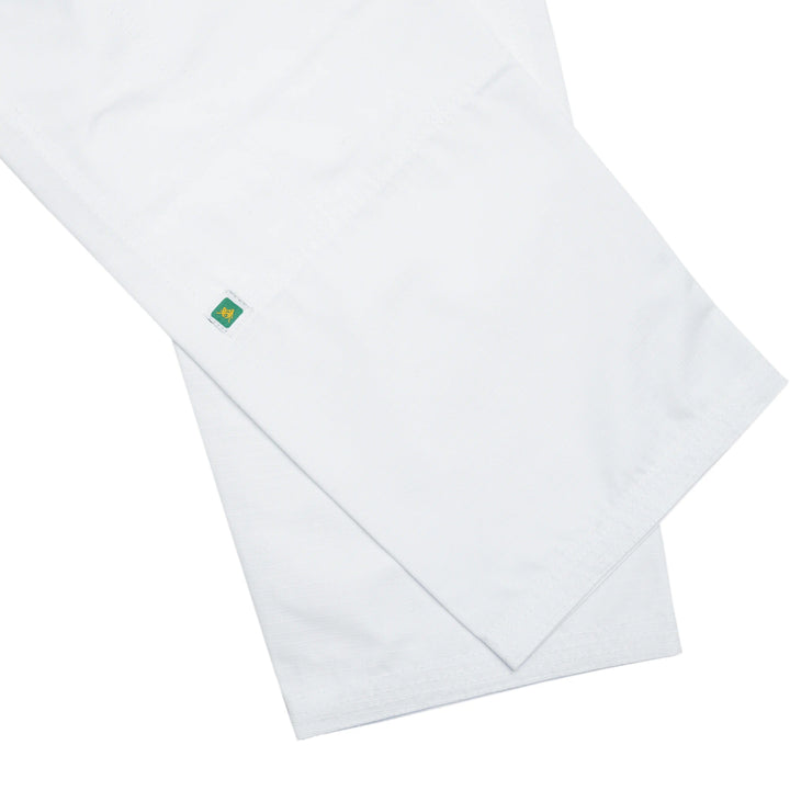 Close-up of minimalist Sahib® logo on Travel BJJ Gi – clean and functional design