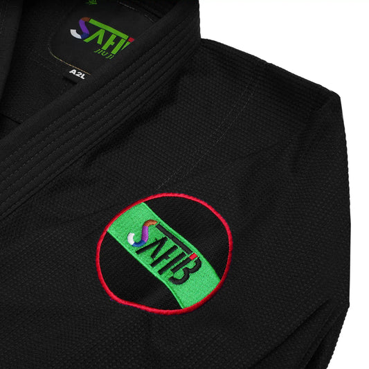 Close-up of UAE-inspired logo embroidery on Sahib® UAE Series BJJ Gi – black edition with national pride colors