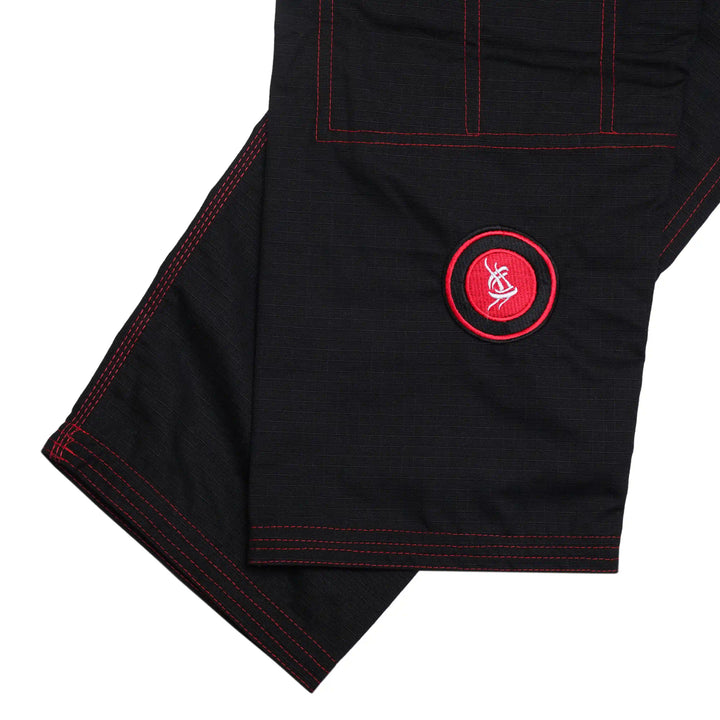  Close-up embroidery on Sahib® UAE Series V2 BJJ pants in black/red – premium finishing for competition-ready training gear